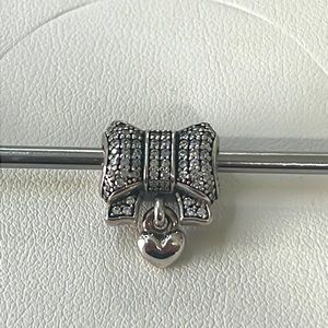Retired Pandora CZ bow and heart charm
